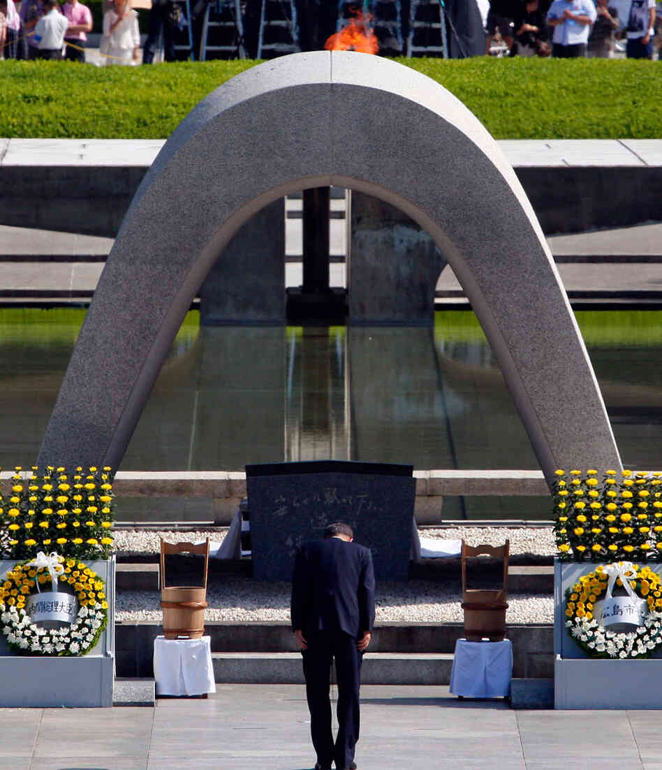 U.N. Secretary-General Ban Ki-moon bows in front of the cenotaph in Hiroshima's Peace Memorial Park. U.N. Secretary-General Ban Ki-moon bows in front of the cenotaph in Hiroshima's Peace Memorial Park.