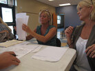 Twin sisters Sheila Newman and Sheryl Lindsay make their case to a BP claims adjuster. Twin sisters Sheila Newman and Sheryl Lindsay make their case to a BP claims adjuster.