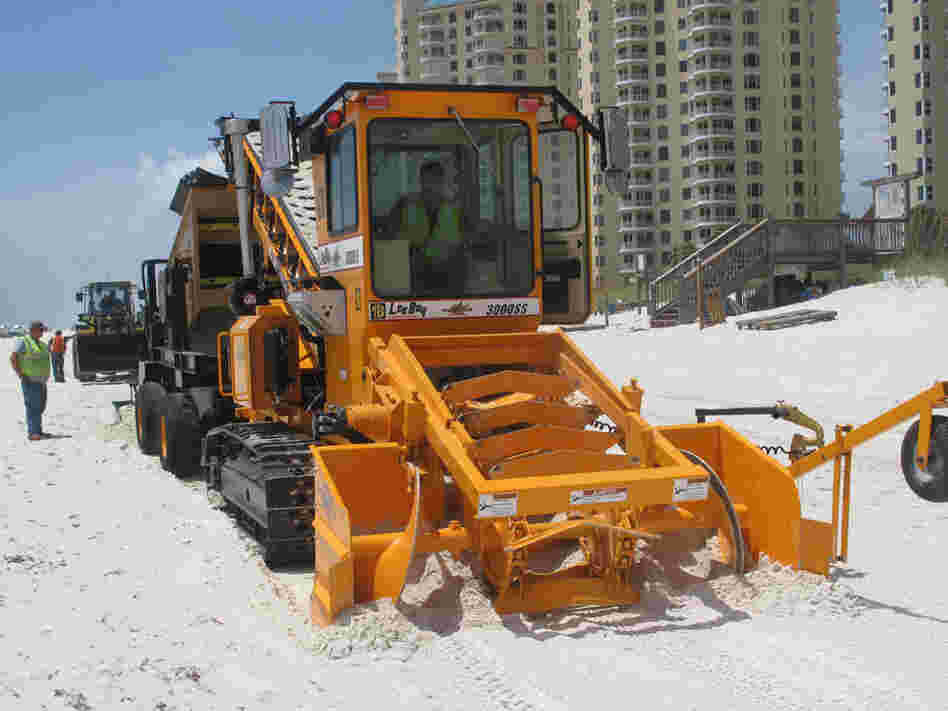 BP says the Sand Shark can clean more sand in 5 minutes than 100 people could in 3 hours.
