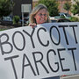 Laura Hedlund, 48, protests in front of a Minnesota Target store.