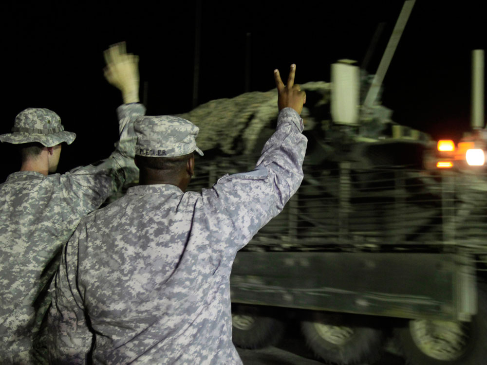 One of the last Stryker armored vehicles to leave Iraq crosses the border into Kuwait.