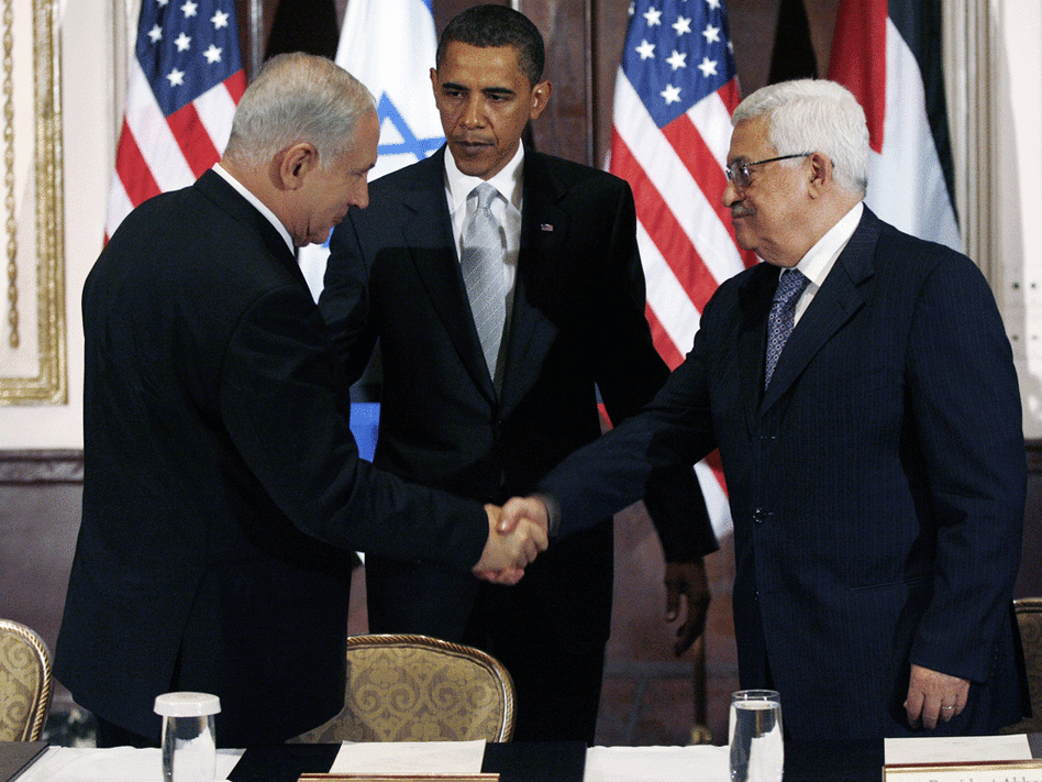 Israel's Benjamin Netanyahu and the Palestinian Authority's Mahmoud Abbas shake hands in 2009.