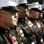 U.S. Marines wait for the dedication ceremony of the National Museum of the Marine Corps. U.S. Marines wait for the dedication ceremony of the National Museum of the Marine Corps.