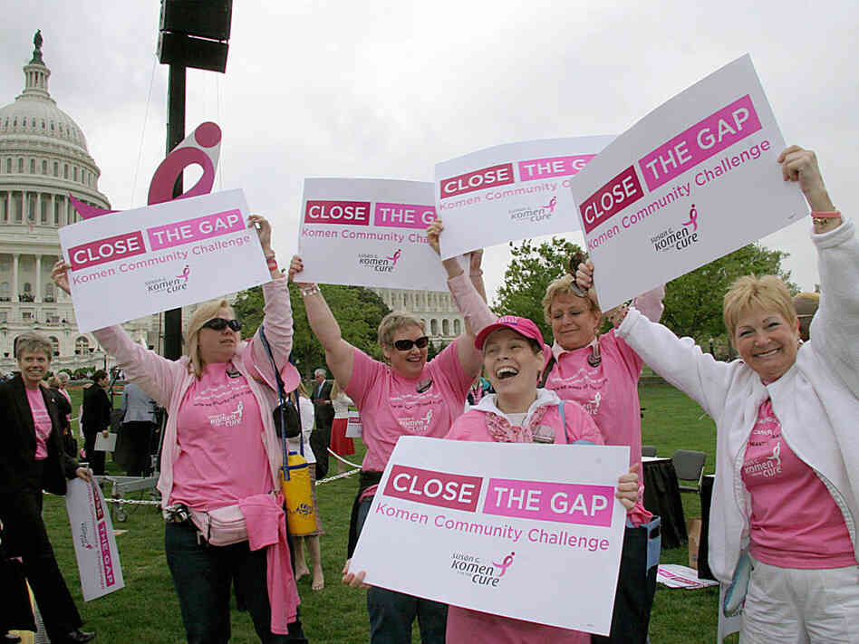 Breast cancer survivors from the Pink Ladies of Charles County, Md., dance at a Capitol Hill rally.