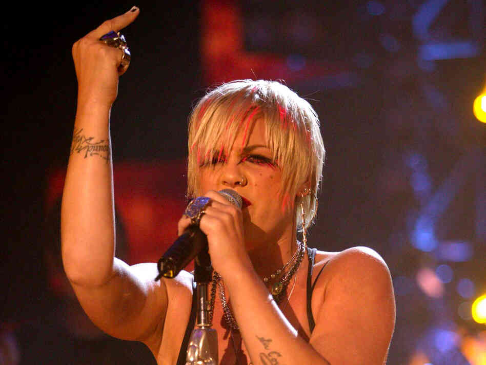Singer Pink "flips the bird" during a 2003 concert in London.