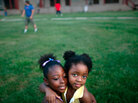 Two girls are seen at a housing project in New Orleans in 2007. Two girls are seen at a housing project in New Orleans in 2007.