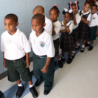 Kindergartners line up on the first day of school at Dr. Martin Luther King Jr. Charter School.