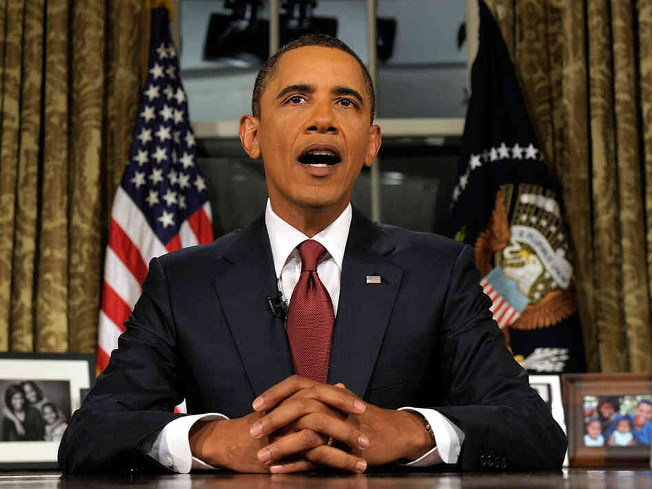 In this video image, President Obama speaks to the nation from the Oval Office.
