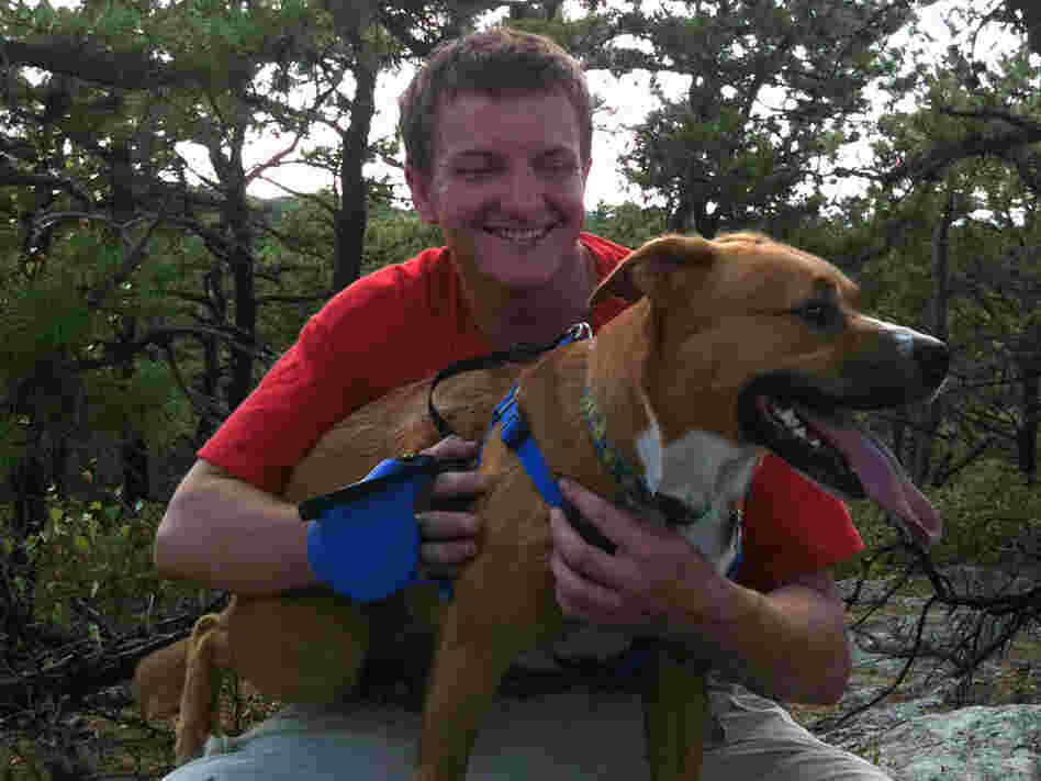 Miles Taylor with his dog after his transition
