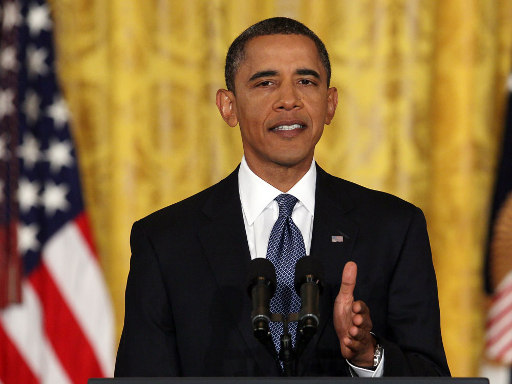 President Obama delivers opening remarks during a White House news conference.