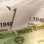 U.S. tax forms and a check from the Treasury Department U.S. tax forms and a check from the Treasury Department