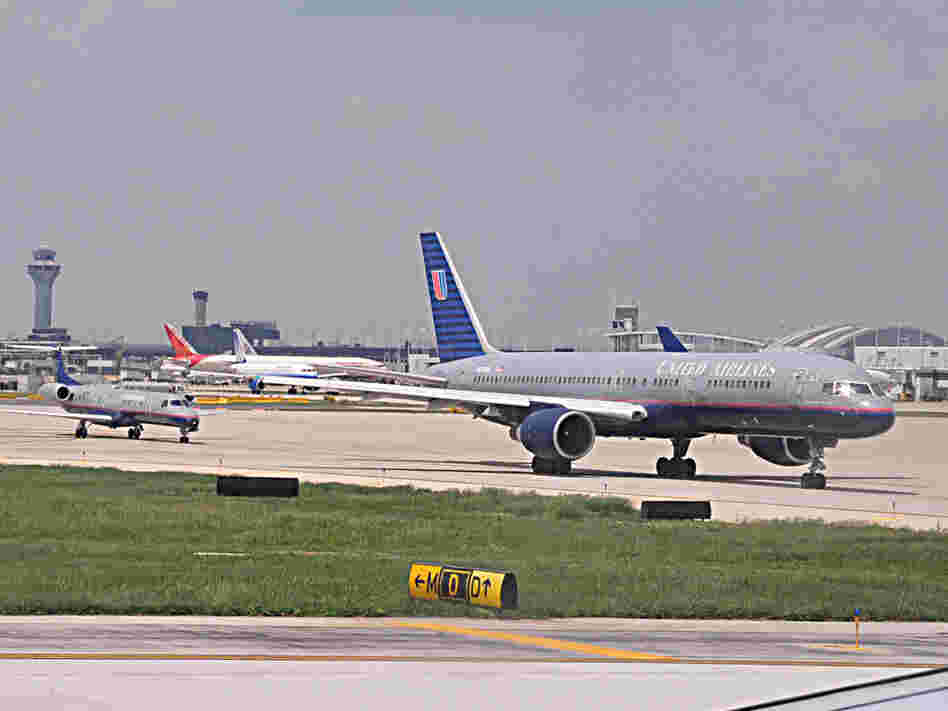 Planes line up for takeoff at Chicago's O'Hare International Airport.