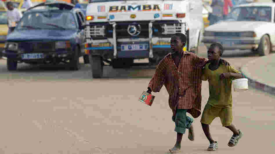 Quranic students begging on the streets of Dakar, Senegal