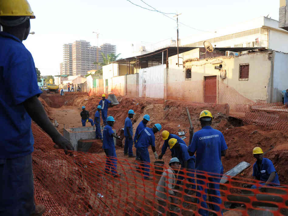 Workers for Brazilian company Odebrecht at a construction site in Angola