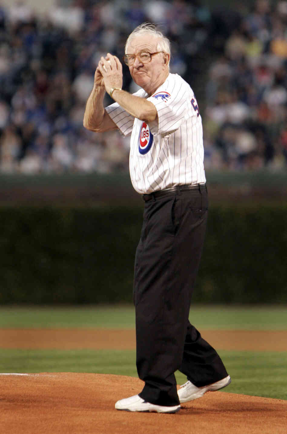 Supreme Court Justice John Paul Stevens throws out the first pitch at Wrigley Field in 2005.