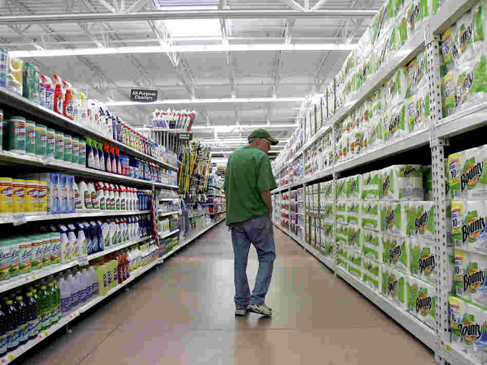 A man looks over items at a new Walmart Supercenter store in Bowling Green, Ohio. 