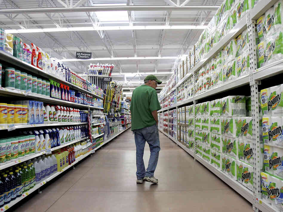 A man looks over items at a new Walmart Supercenter store in Bowling Green, Ohio. 