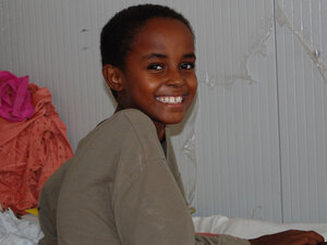Howa Mudi, 10, lost both legs in a mortar attack Howa Mudi, 10, lost both legs in a mortar attack