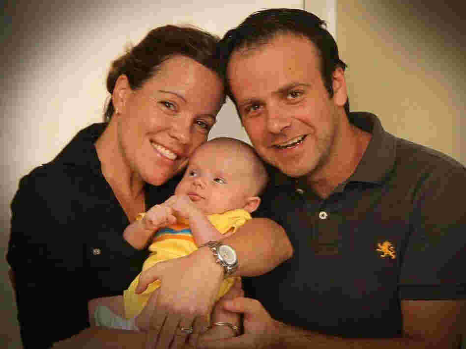 Carolyn and Sorin Popescu, with their daughter, Lina