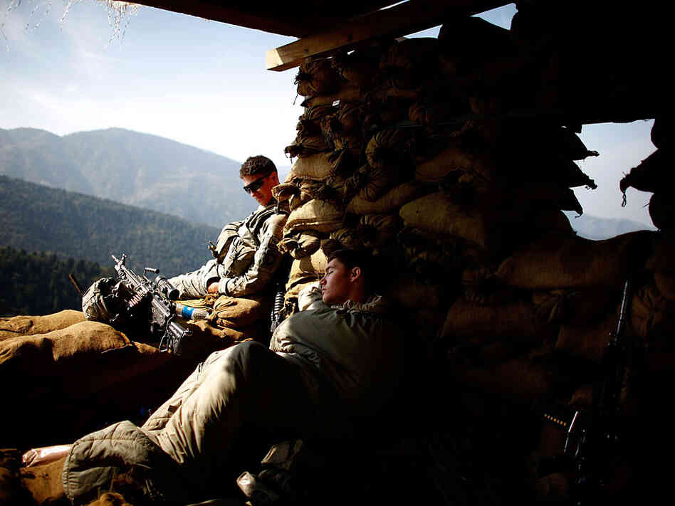 Soldiers with Alpha Company of the 101st Airborne Division get some much needed rest.