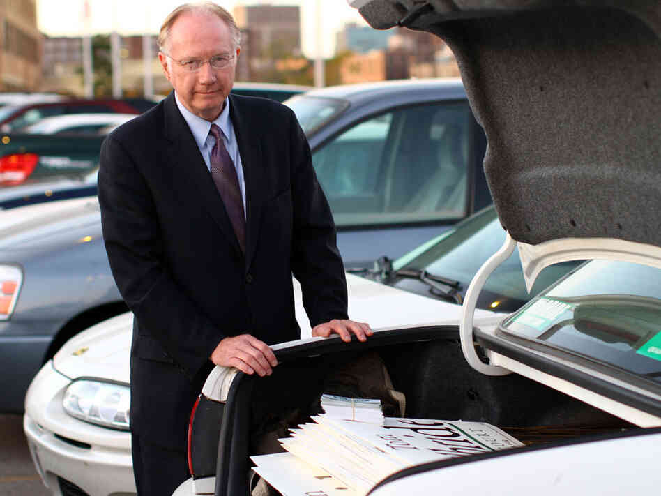 Justice Kilbride and his roving campaign office, which is the trunk of his sedan.