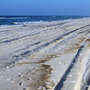 Waves breaking on the shore in Orange Beach, Ala., leave behind an oily residue.