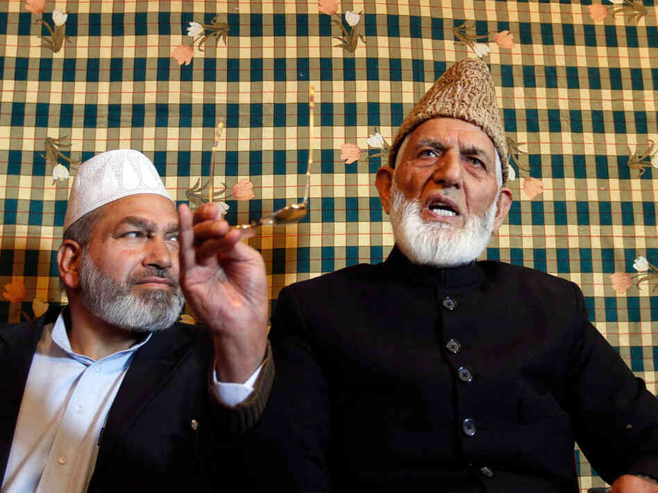 Kashmiri separatist leader Syed Ali Shah Geelani, right
