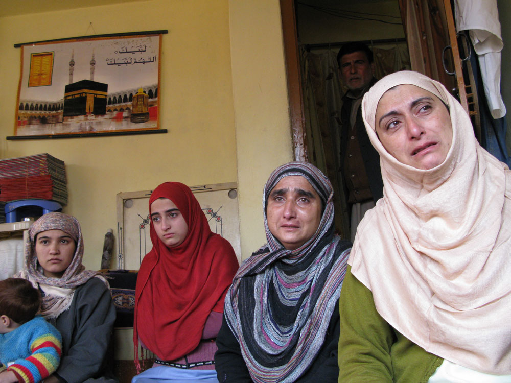 Relatives mourn the death of Mudasir Ahmed Kachroo, a Kashmiri man fatally shot by Indian security forces