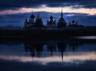 The walled Solovetsky monastery at dusk in Russia's remote Solevetsky Islands near the Arctic Circle The walled Solovetsky monastery at dusk in Russia's remote Solevetsky Islands near the Arctic Circle