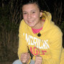 Magan Hebert, 15, poses with the young buck, or "spike" that she shot in Wayneboro, Miss.