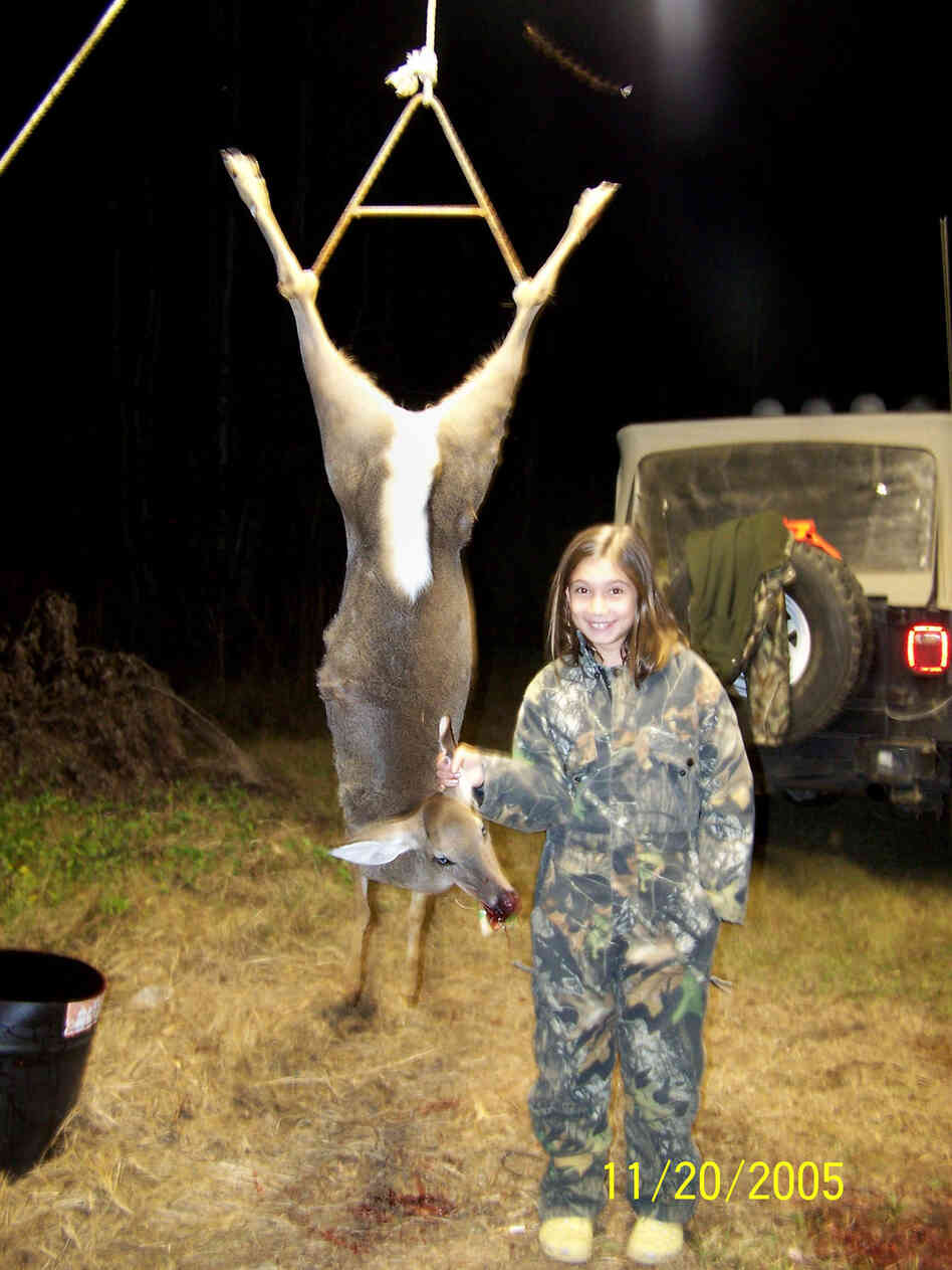 Magan shown with the first deer she killed Magan shown with the first deer she killed