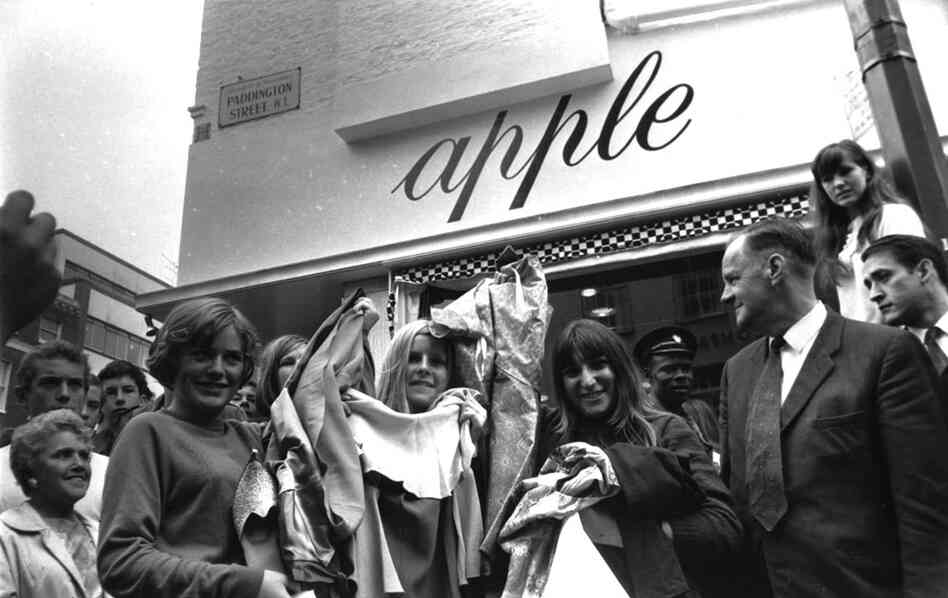 People line up outside the Beatles' store in 1968. People line up outside the Beatles' store in 1968.