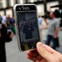 Snapping a photo with the iPhone. Snapping a photo with the iPhone.