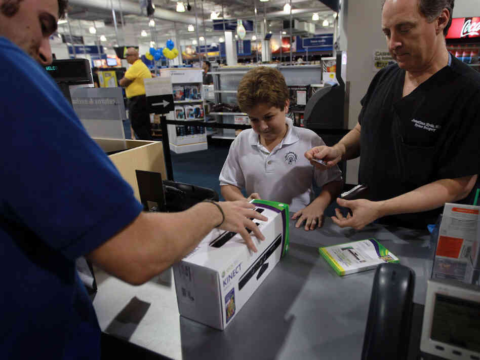 Peter Martin sells Microsoft's new Kinect controller at a Best Buy.