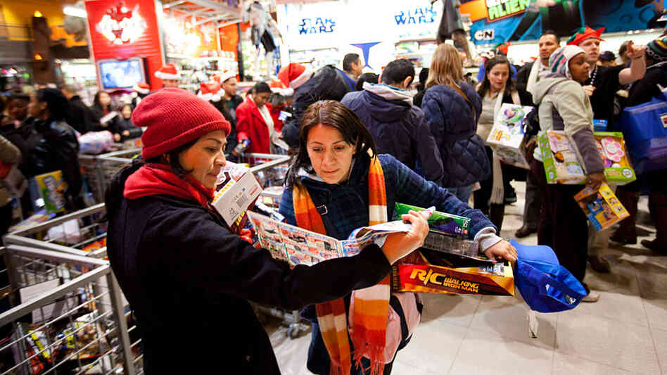 Shoppers look for bargains at Toys R Us in New York City. Shoppers look for bargains at Toys R Us in New York City.