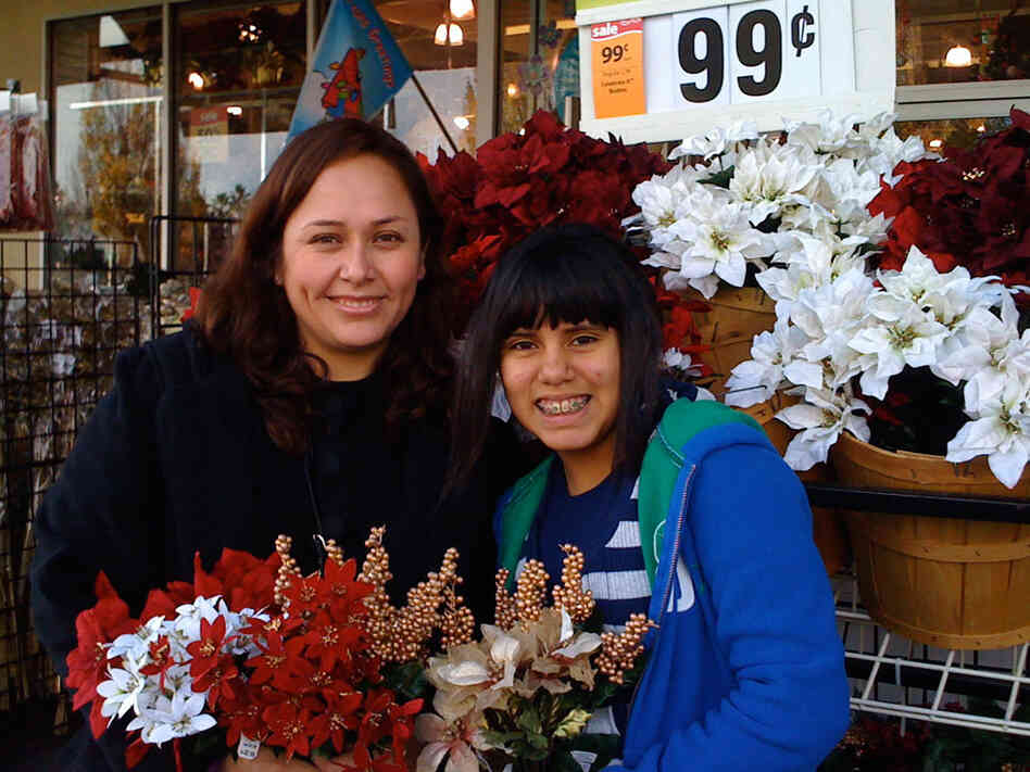 Guissella Nakatani of Sacramento, Calif., visits a craft store with her daughter, Lili Quevedo.