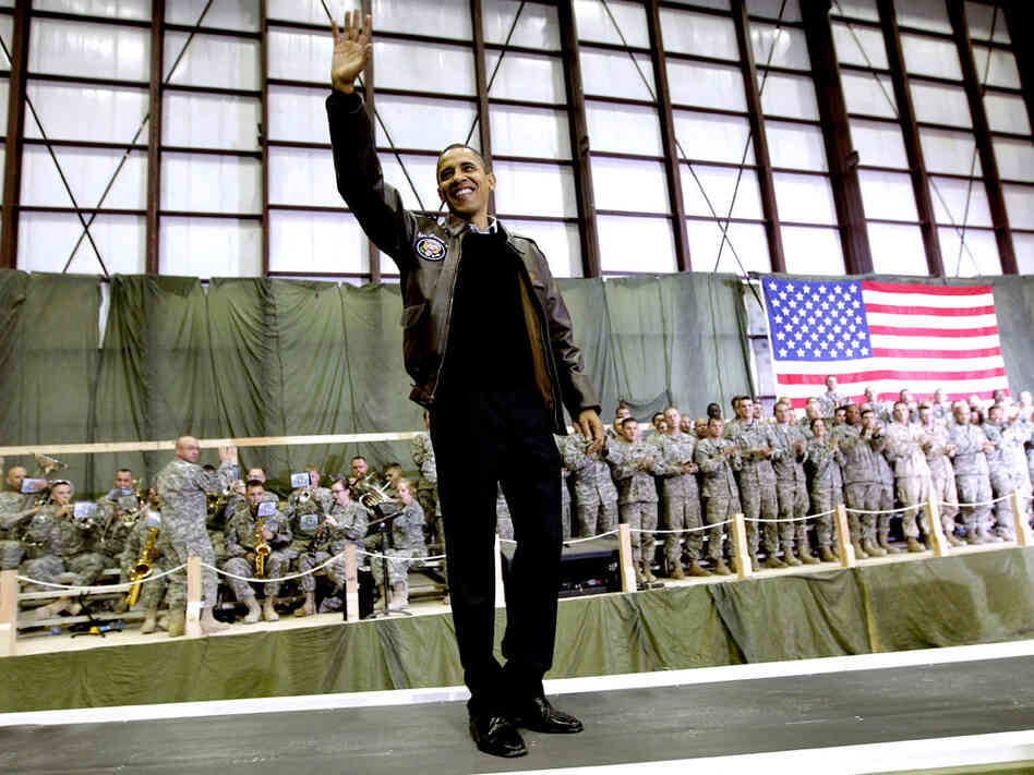 President Obama waves as he is introduced to the troops at Bagram Air Field in Afghanistan.