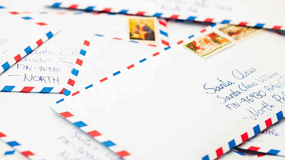 Envelopes addressed to Santa in the North Pole.