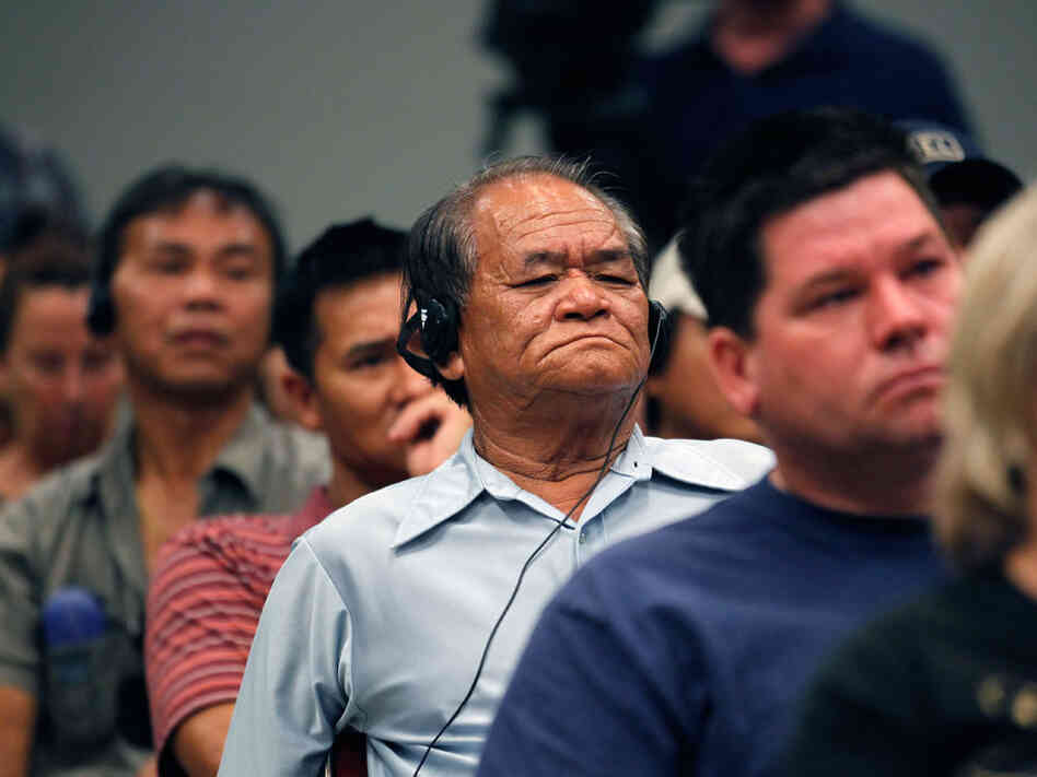 Members of the Vietnamese community listen as independent claims administrator Ken Feinberg and Louisiana Sen. Mary Landrieu, D-La., conduct a town hall meeting for residents economically impacted from the Deepwater Horizon oil spill.