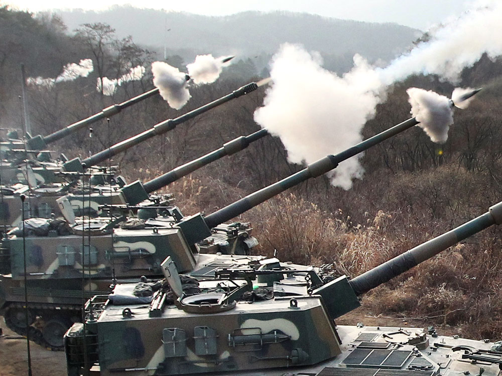 The South Korean Army conducts live artillery exercise 20 miles from the North-South Korea border, Dec. 23, 2010.