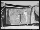 Photo of Claud Thornton's traveling crime museum by Farm Security Administration photographer Jack Delano Photo of Claud Thornton's traveling crime museum by Farm Security Administration photographer Jack Delano