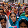 Immigrants like these Indians at a Sikh festival in Barcelona are bolstering Europe's stagnant population growth rate.