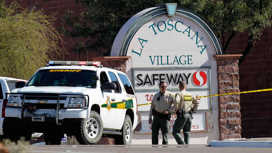 Law enforcement officials were still trying to piece together a chronology of events and a possible motive for Saturday's shooting rampage at a Safeway in Tucson, Ariz.