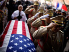 Military officials salute the casket of Gen. Vang Pao in Fresno, Calif. Military officials salute the casket of Gen. Vang Pao in Fresno, Calif.