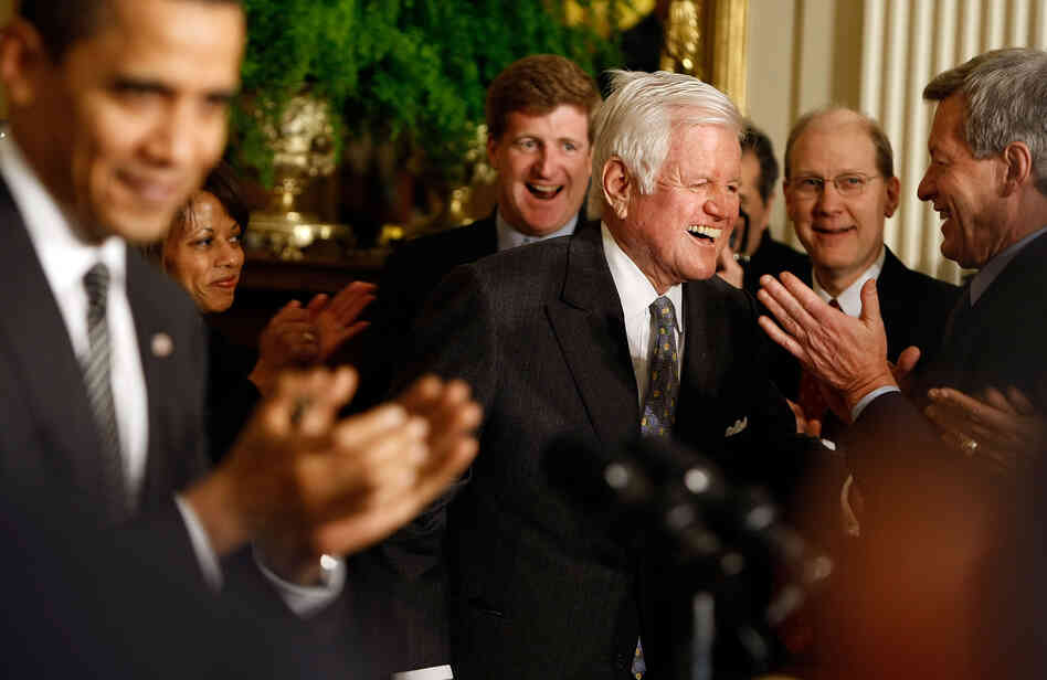 President Obama and others clap for Sen. Kennedy at the White House forum on health care reform.