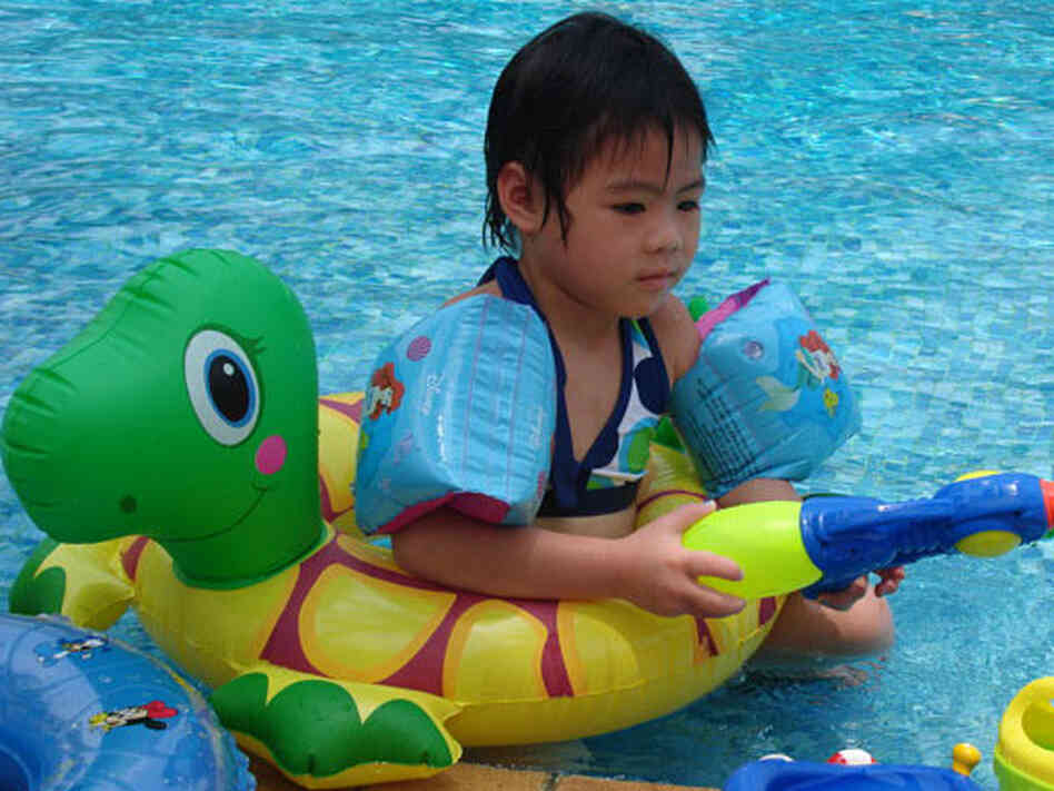 Harper Scruggs plays in a hotel pool in Beijing. Harper Scruggs plays in a hotel pool in Beijing.