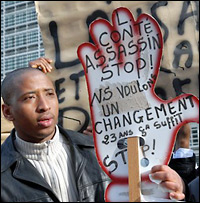 A protester participates in a demonstration against the Guinean government, Feb. 16, 2007.