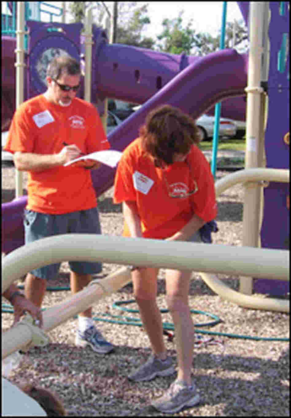 KaBOOM! volunteers assemble a jungle gym in Bay St. Louis, Miss.