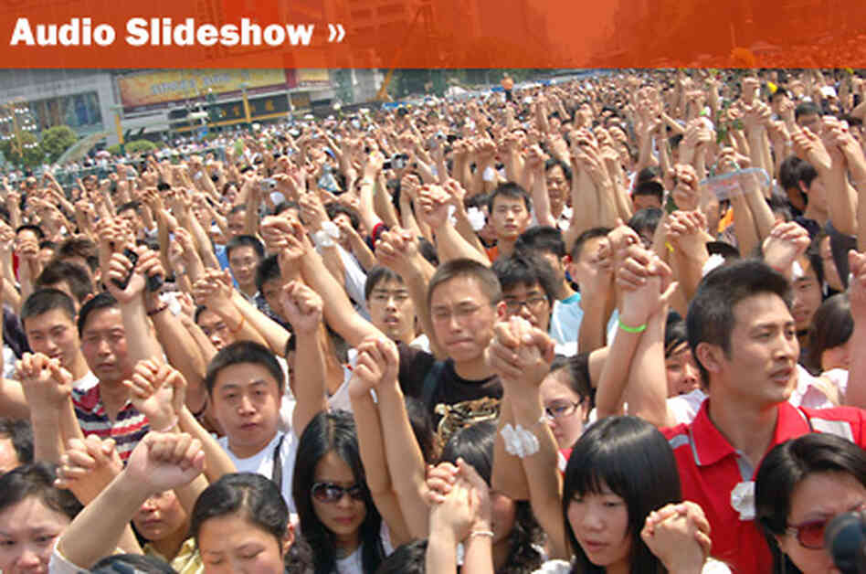 A large crowd gathered for a rally after the earthquake. A large crowd gathered for a rally after the earthquake.