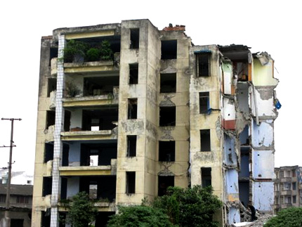One of countless destroyed apartment buildings still standing in Dujiangyan, China, in 2009. Photo: Melissa Block, NPR